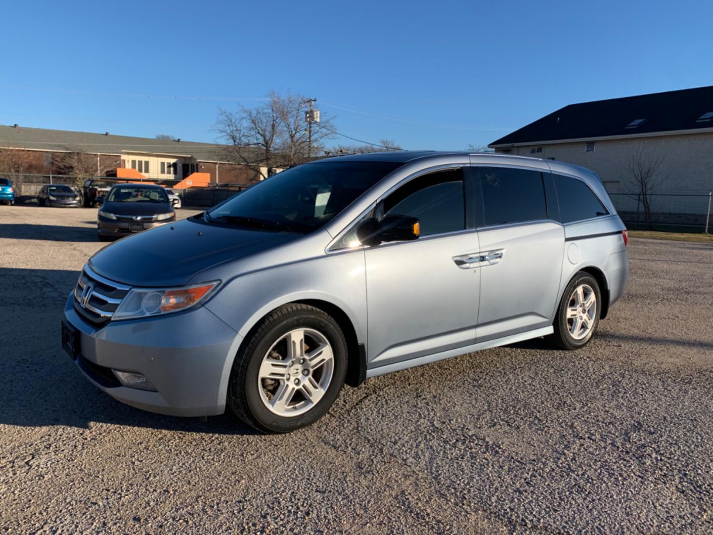 2012 Blue /gray Honda Odyssey Touring (5FNRL5H94CB) with an 3.7L L5 DOHC 20V engine, AUTOMATIC transmission, located at 1830 North Belt Line Road, Irving, TX, 75061, (469) 524-0199, 32.834373, -96.993584 - Photo#2